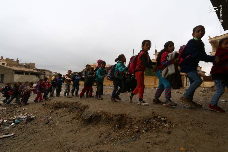 عکس/ تحصیل در مدارس تخریب شده رقه